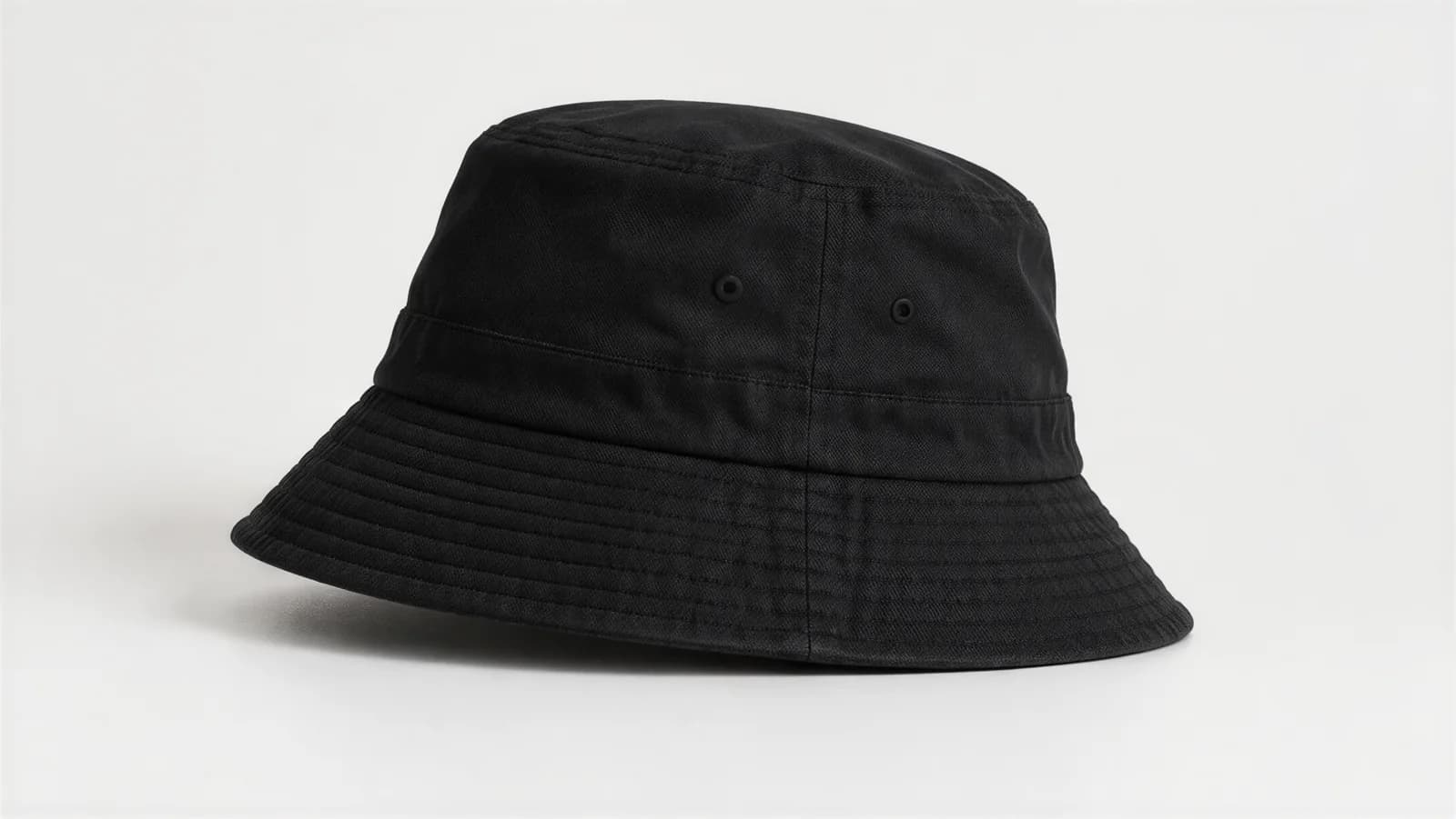 Black bucket hat studio side view