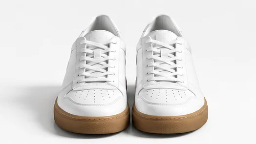 White leather sneakers with a gum sole, pair from the front