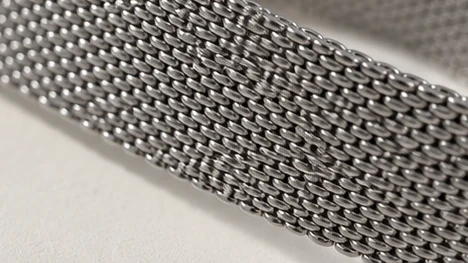 Macro close-up of the steel mesh strap