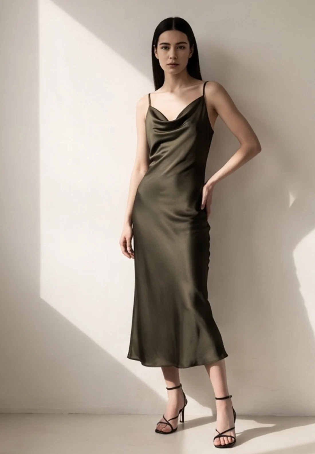 Olive satin slip dress, on the model
